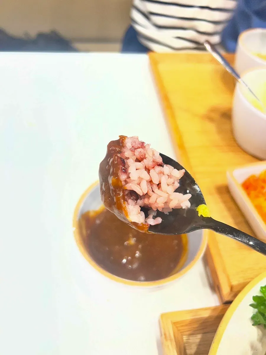 Curry served alongside the sweet potato cheese katsu