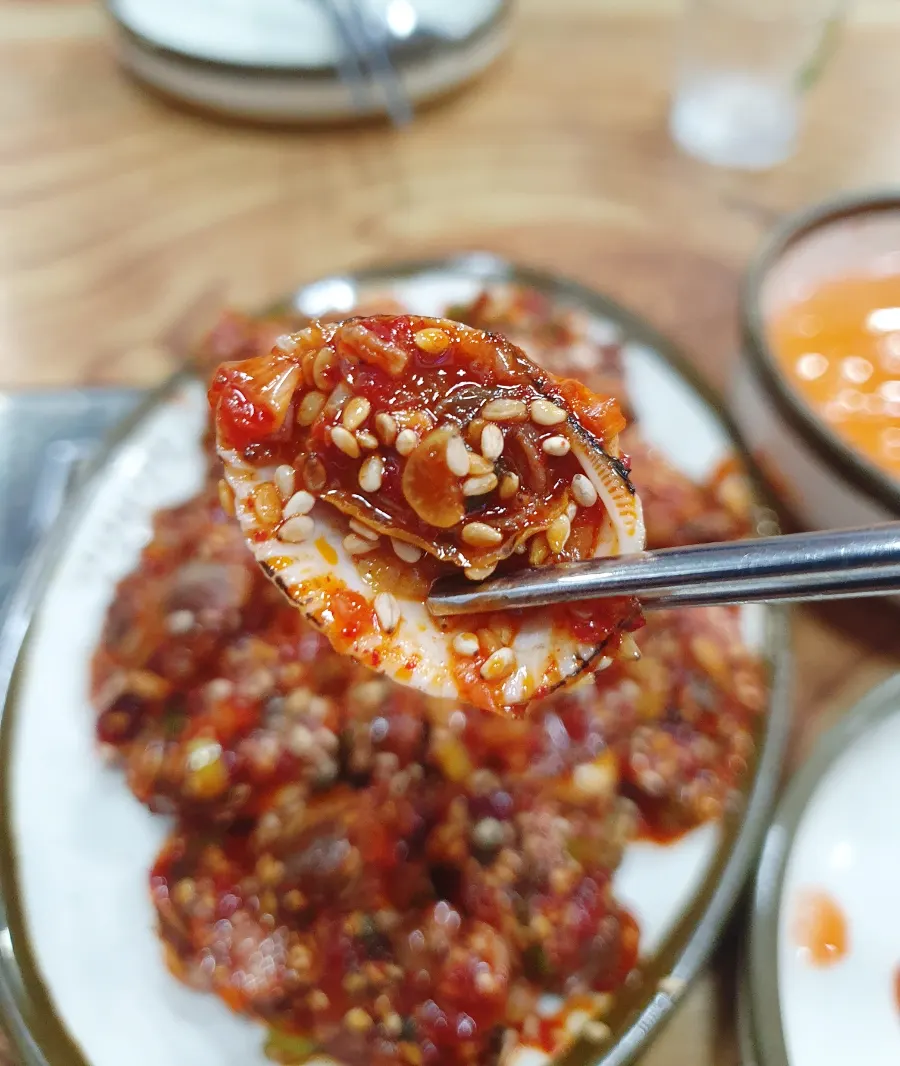 Dongchimi, kimchi side dishes, and cockle salad