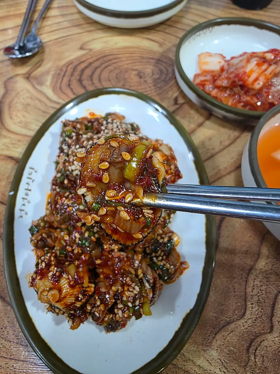 Full table spread of dakbokkeumtang and set menu dishes