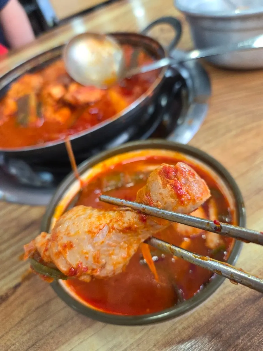 Dakbokkeumtang broth simmered down until thick