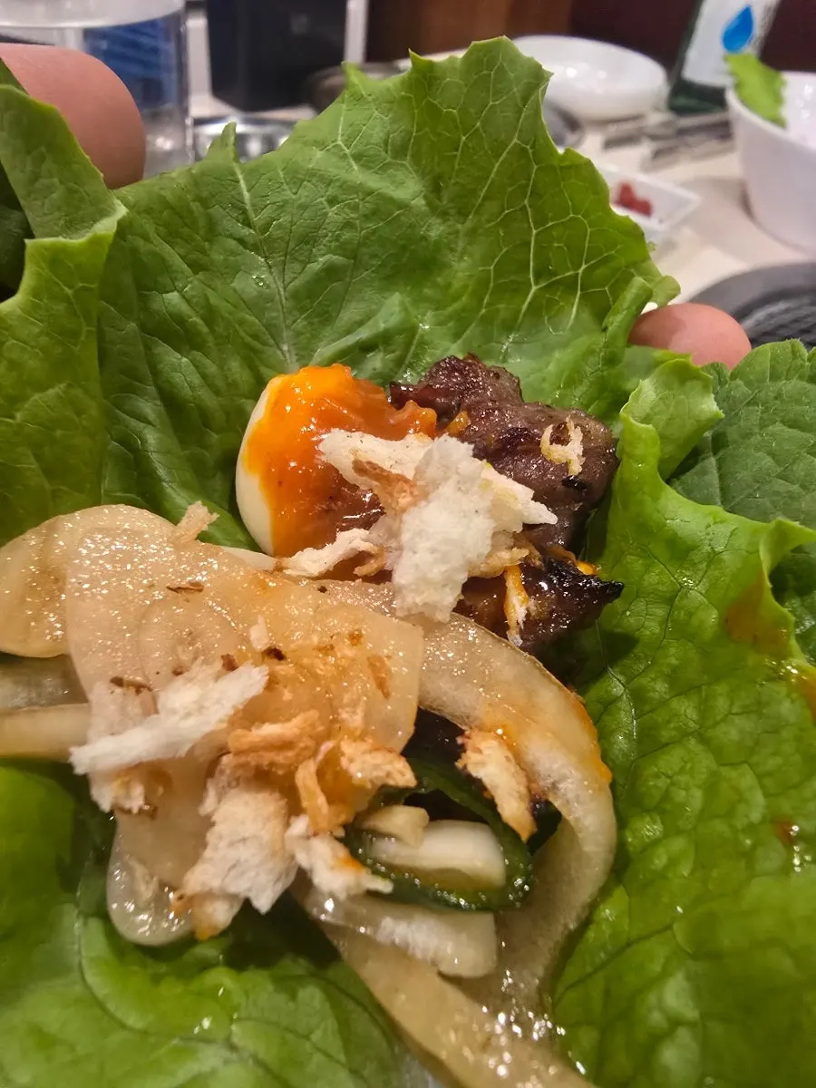 A well-grilled piece of beef galbi