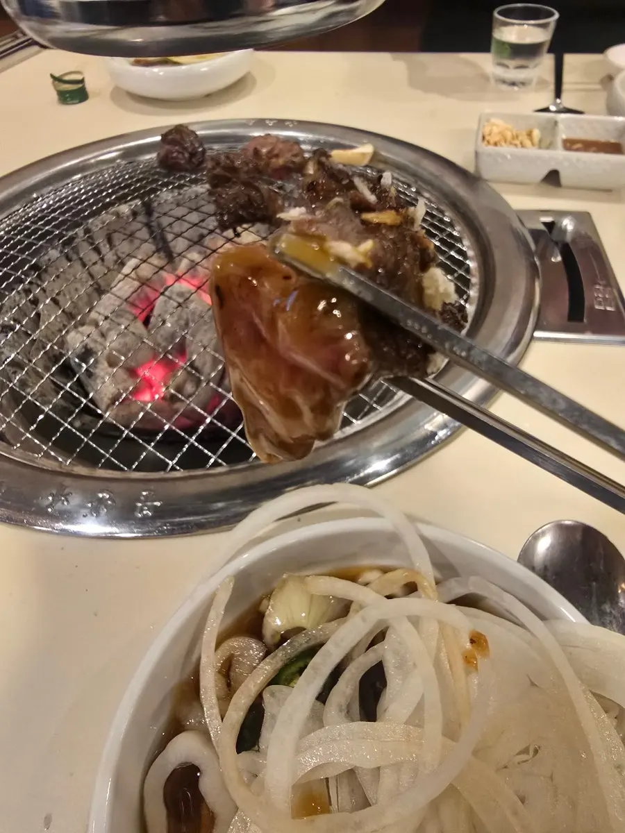 Doenjang jjigae served alongside the meat