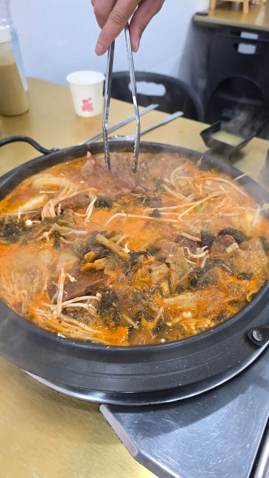 Inside the pot showing potatoes and napa cabbage