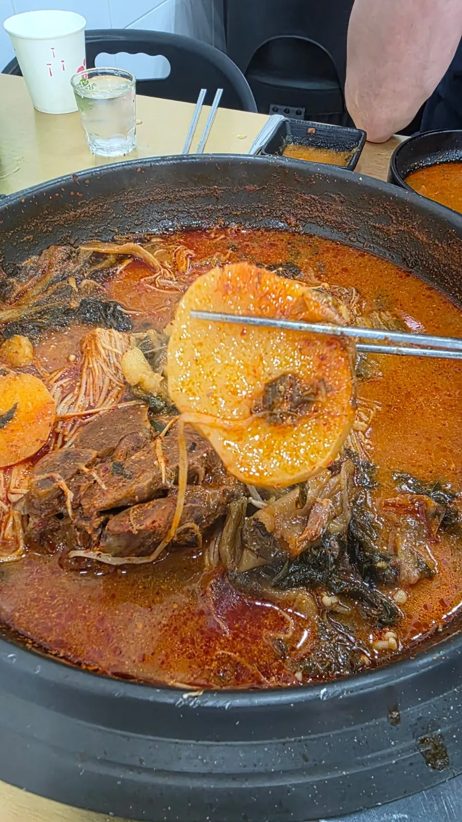 Gamjatang meat dipped in sauce