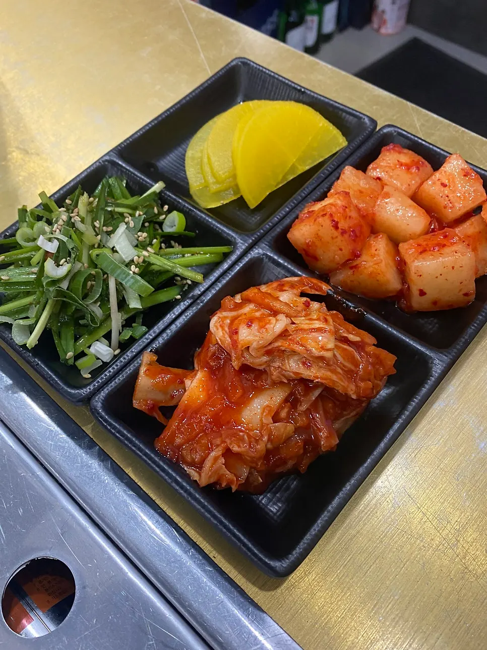 Side dish spread with pickled radish and seasoned chives