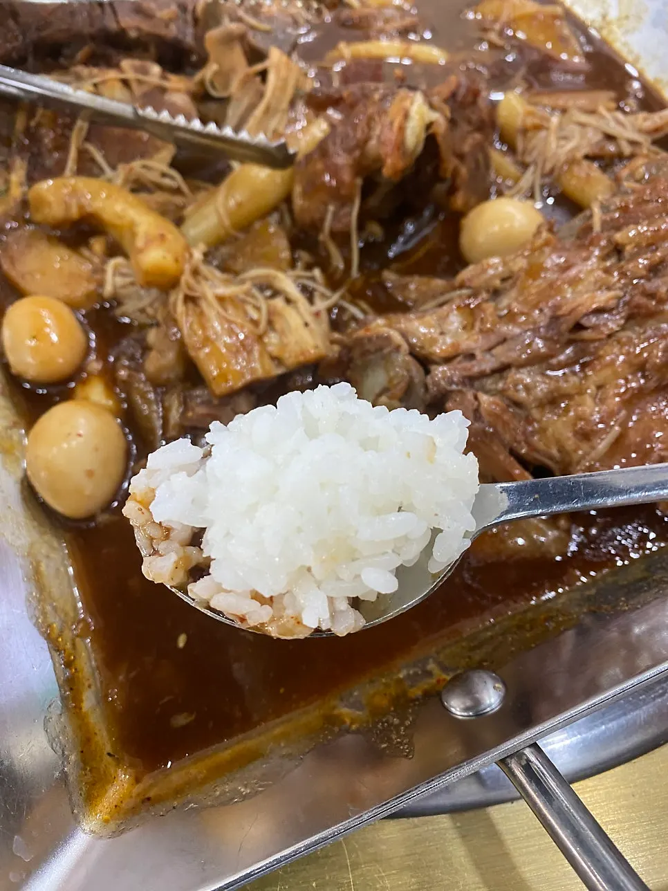 The gungjung bbyeojjim near the end, with a light broth remaining