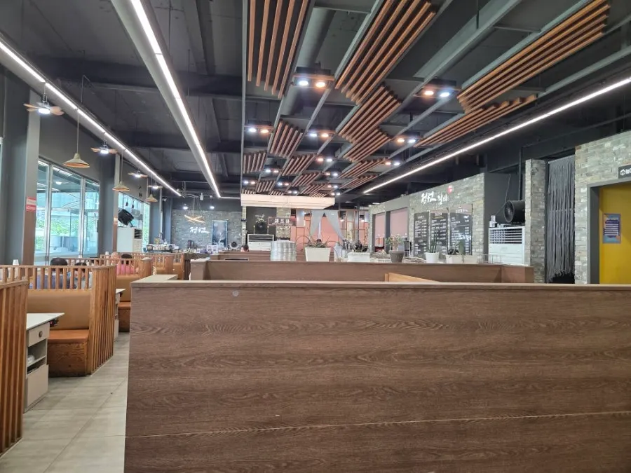 Hall seating with tables for four and group tables