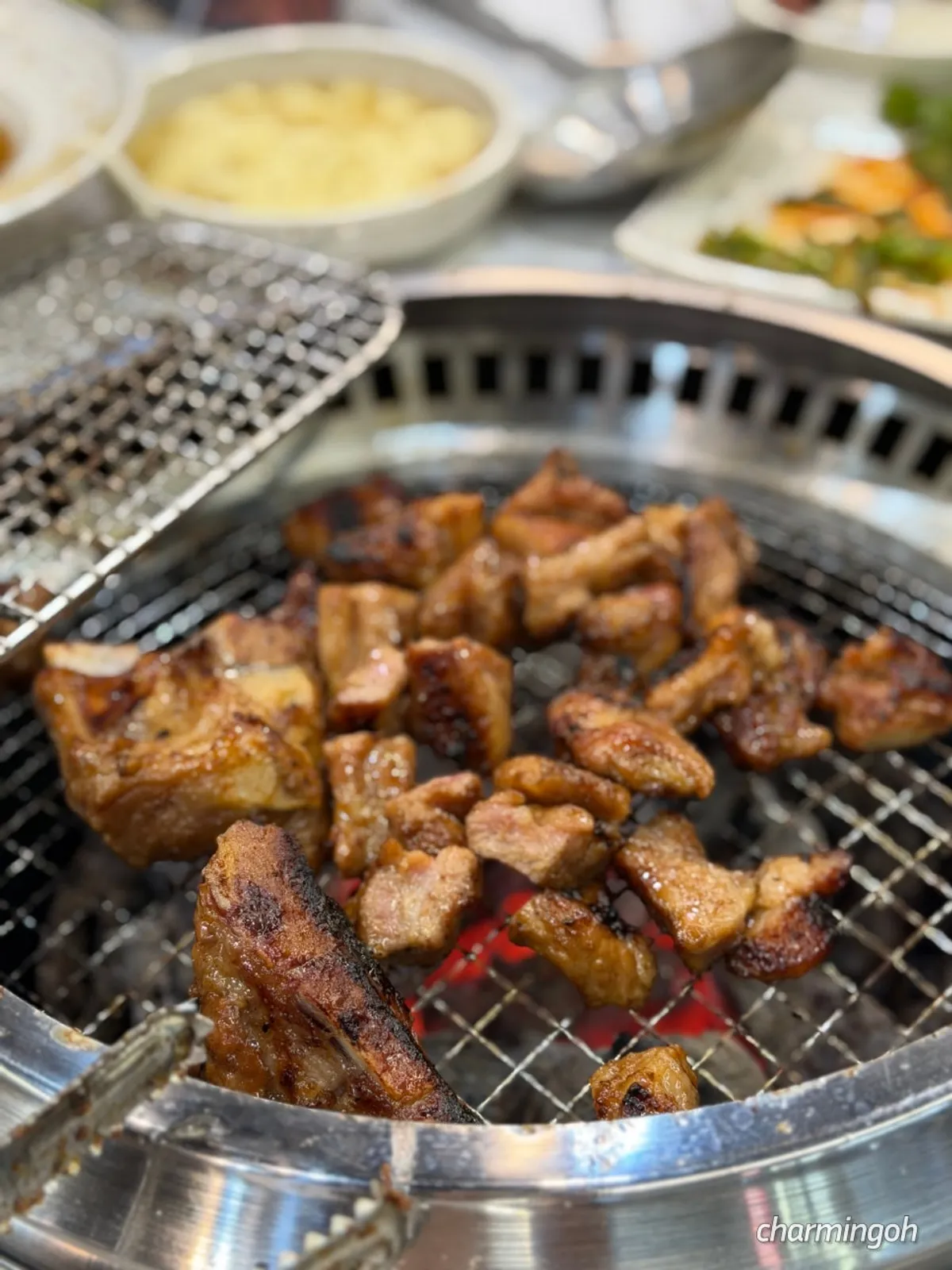 Charcoal-grilled pork galbi paired with ssam vegetables