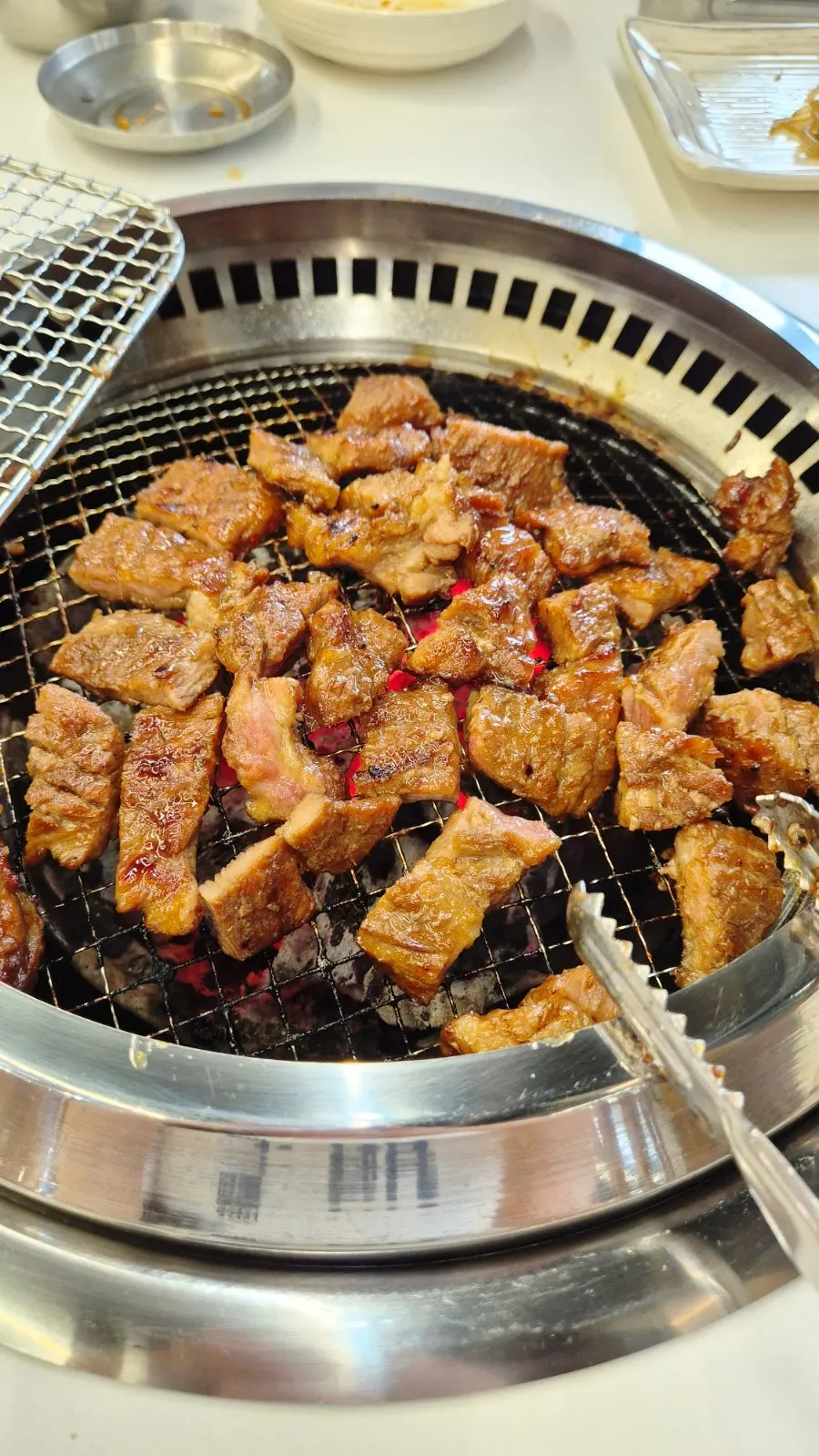 A fully grilled piece of Jeongwon marinated grill