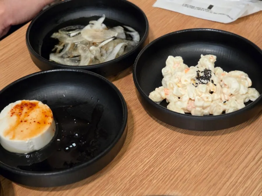 Side dish plates served alongside the meat