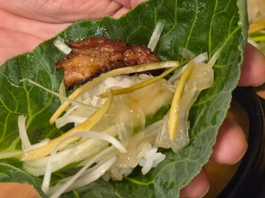 Seasoned galbi eaten with fresh lettuce wraps