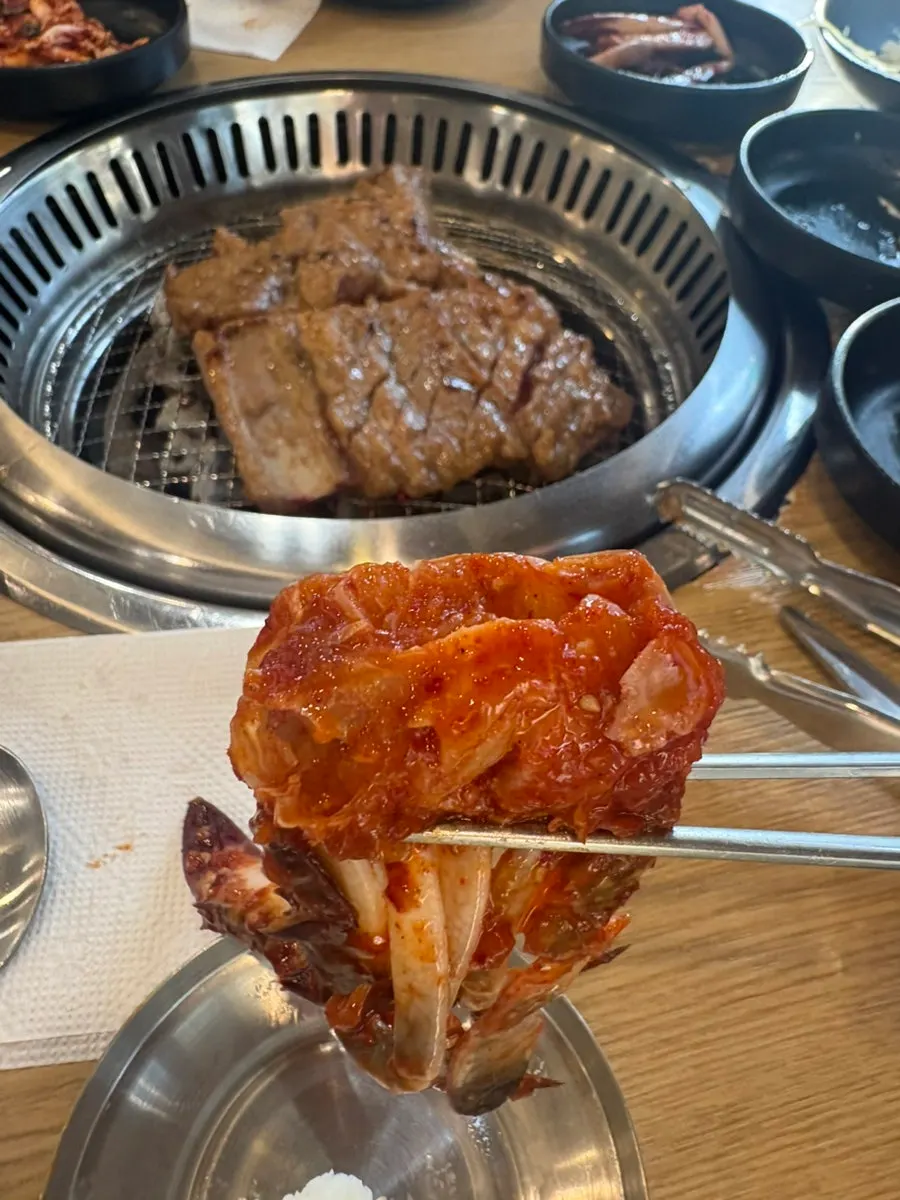 Grilled pork galbi served with side dishes
