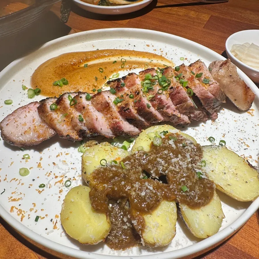 A thick cut of Korean pork belly steak