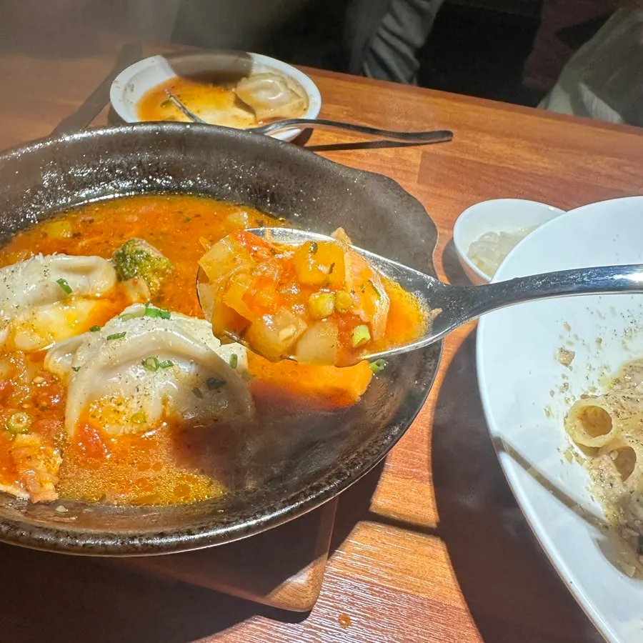 Tangy tomato sauce with mandu