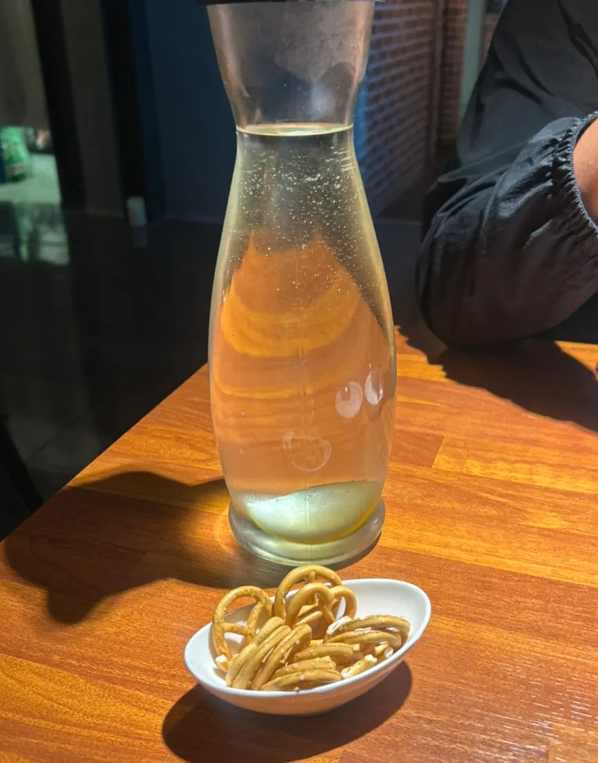 Pretzels and lemon-lime water at Adam