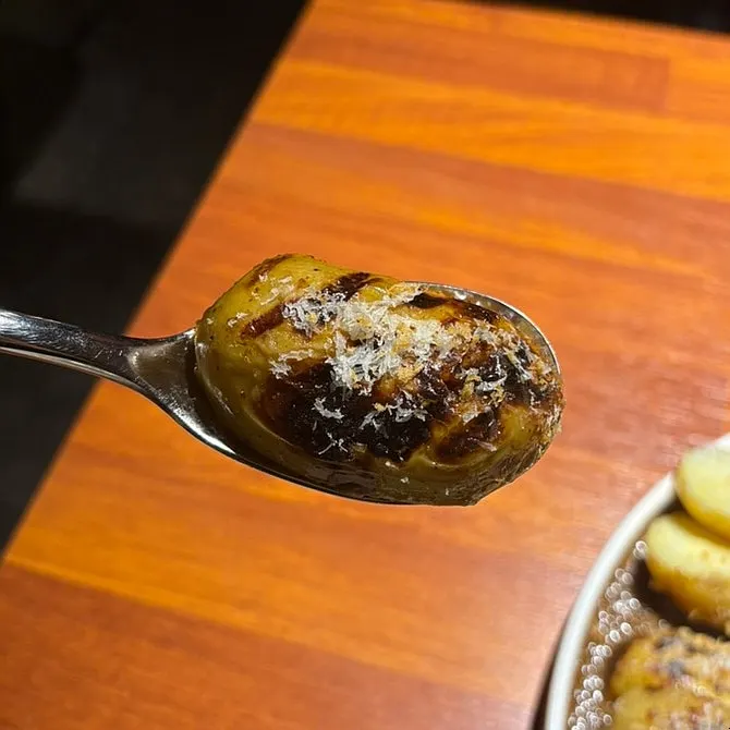 Boiled potatoes and pork belly steak