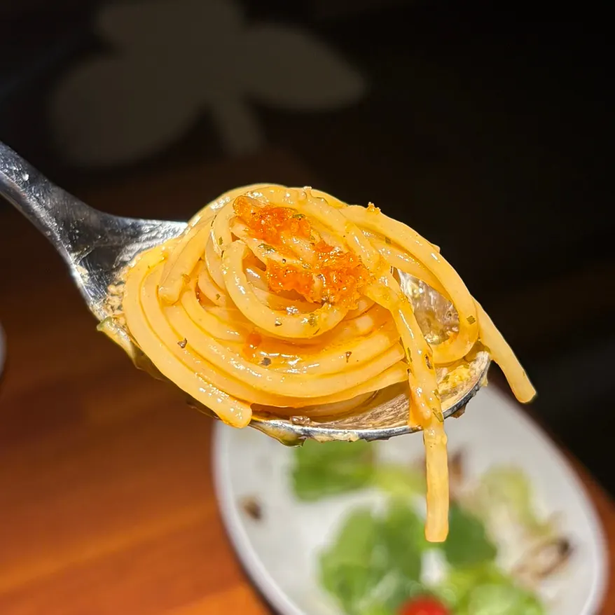Aglio e olio noodles thoroughly coated in sauce