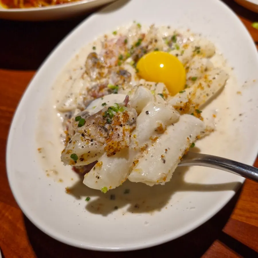 Adam's carbonara tteokbokki with rice cakes in cream sauce
