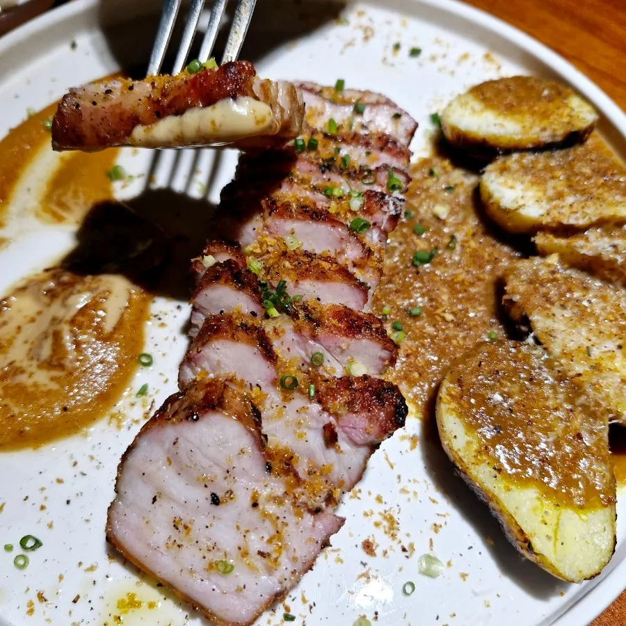 Cross-section of the pork belly steak showing clear grill marks