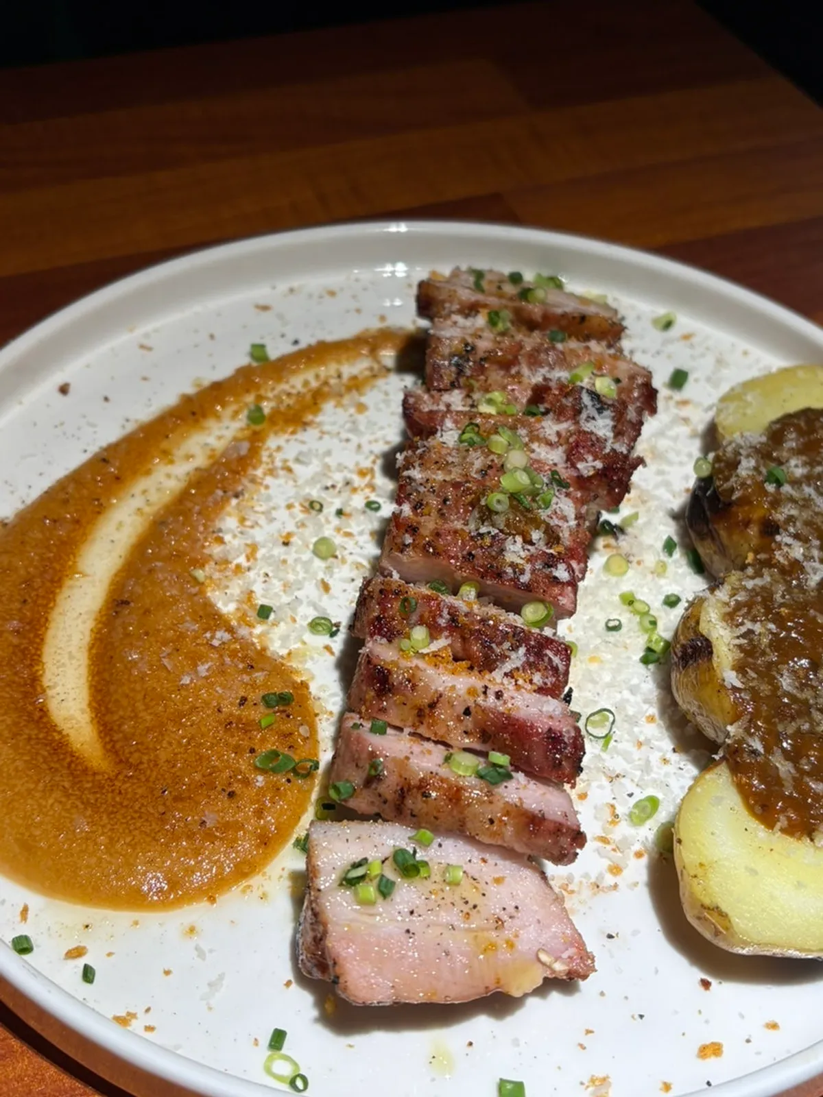 Plating of Adam's Korean pork belly steak