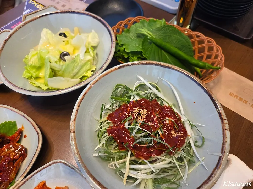 Full spread of side dishes laid out on the table