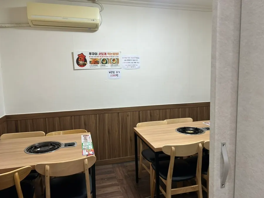 Spacious dining hall and entrance to the private room table