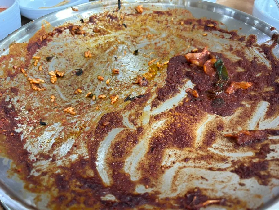 A bowl of cheese fried rice served up on a plate