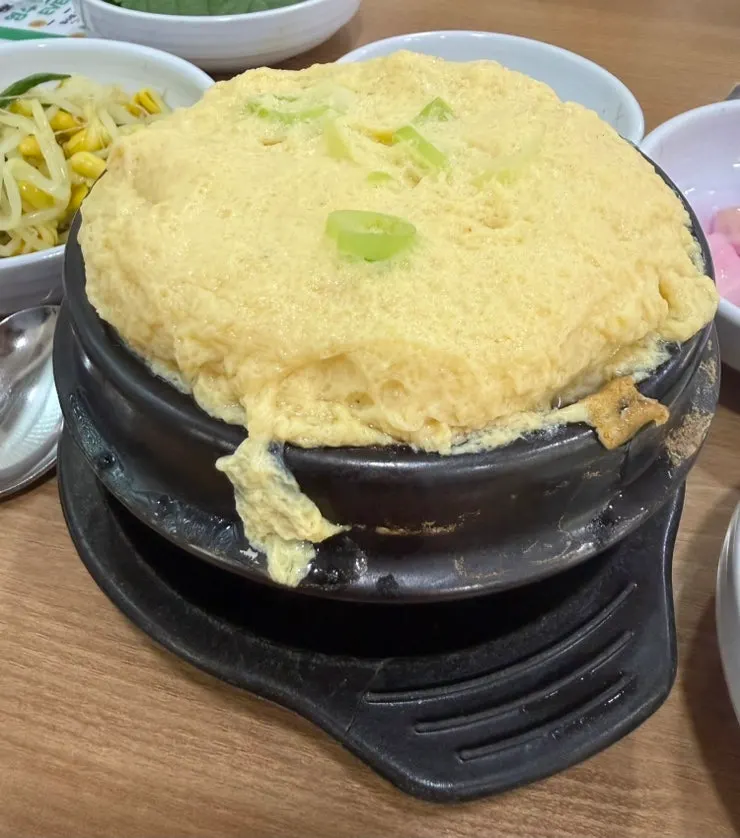 Steamed egg served with jjukkumi
