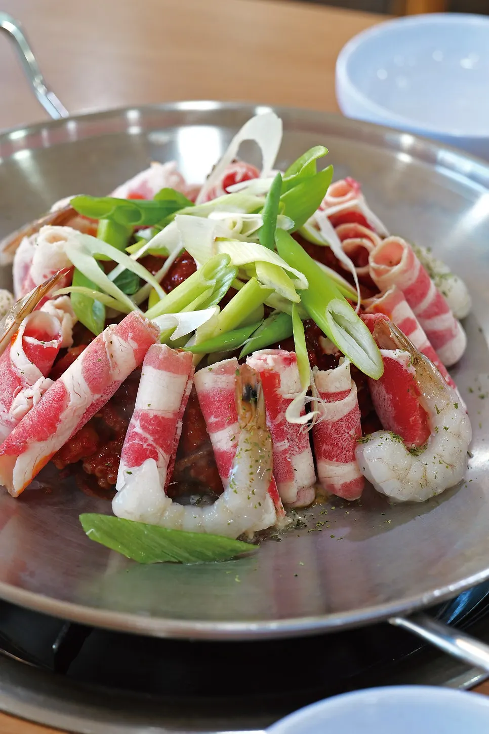 Octopus tossed in red sauce with large shrimp