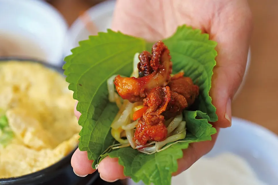 A plump piece of octopus and beef belly