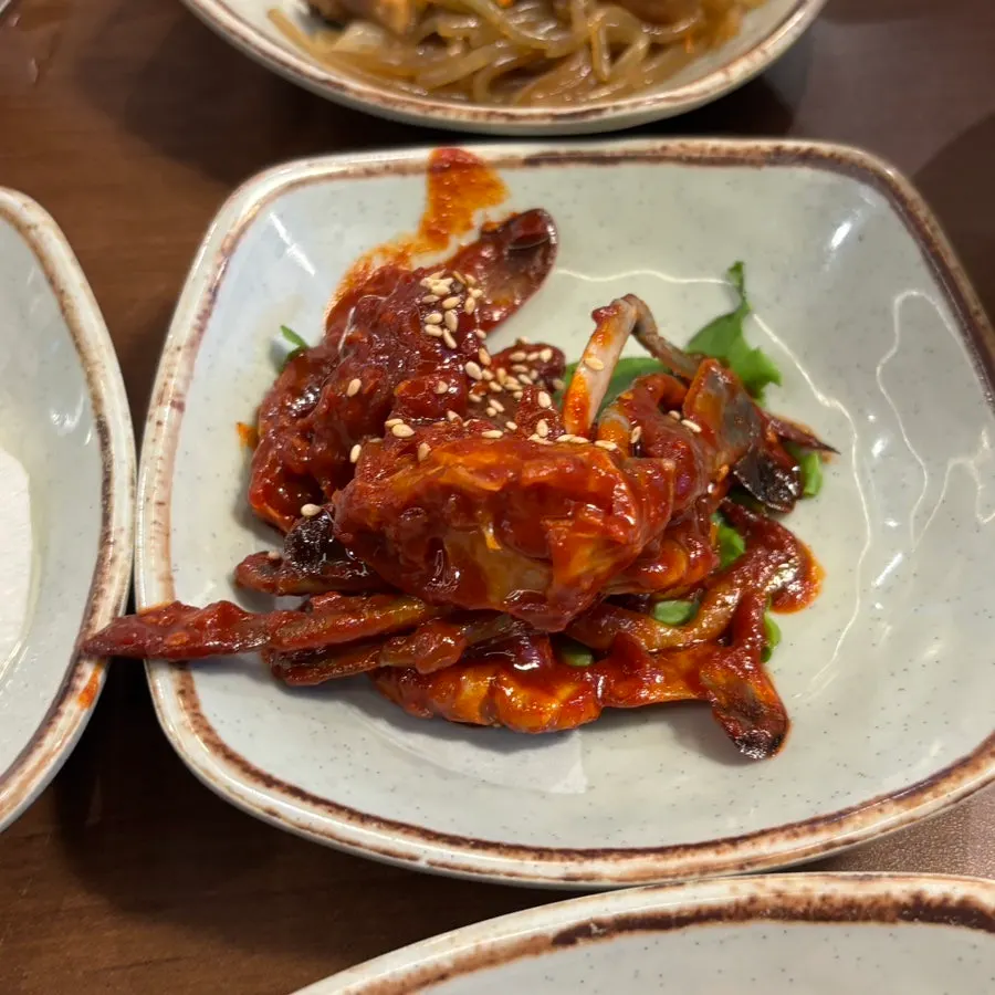Plate of pa-kimchi and seasoned skate side dishes