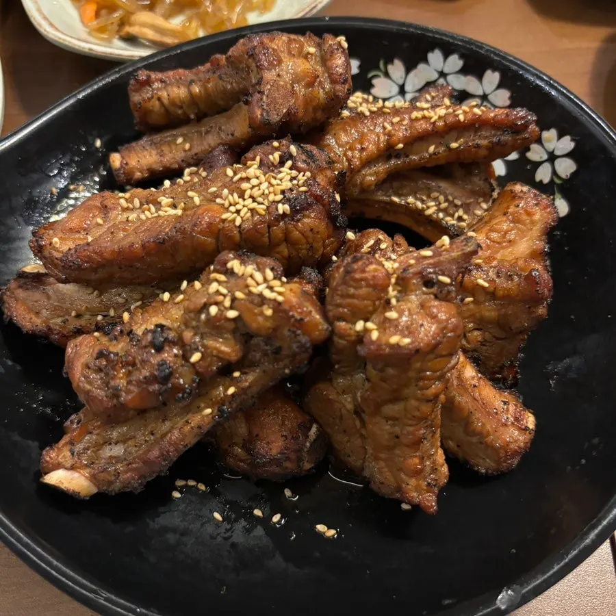 Jjokgalbi dipped in the special sauce