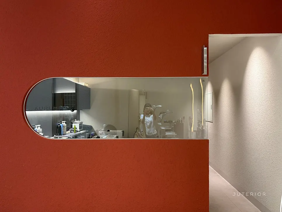 Shampoo room separated from the service area