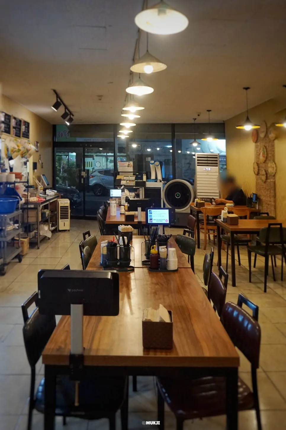 Seating inside Phodam with a local restaurant atmosphere