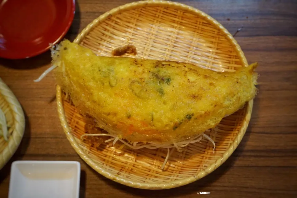 Full table spread of Phodam's banh xeo