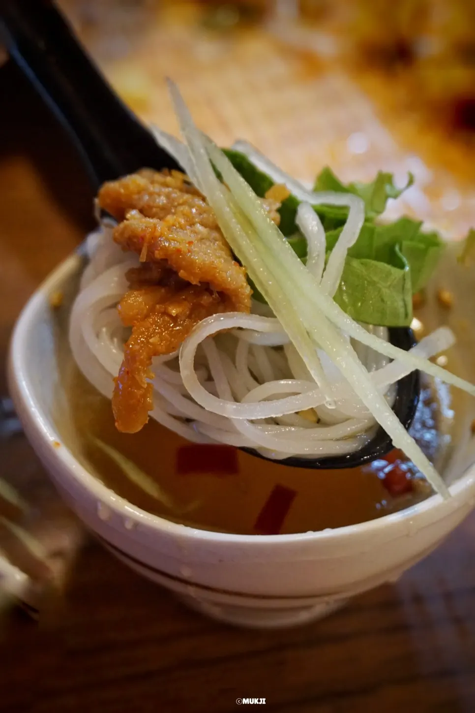 Cha gio fried spring rolls on top of bun cha