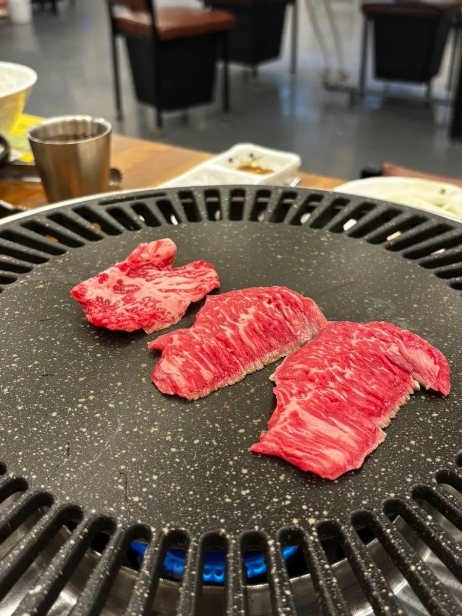 Korean beef platter grilling on the plate