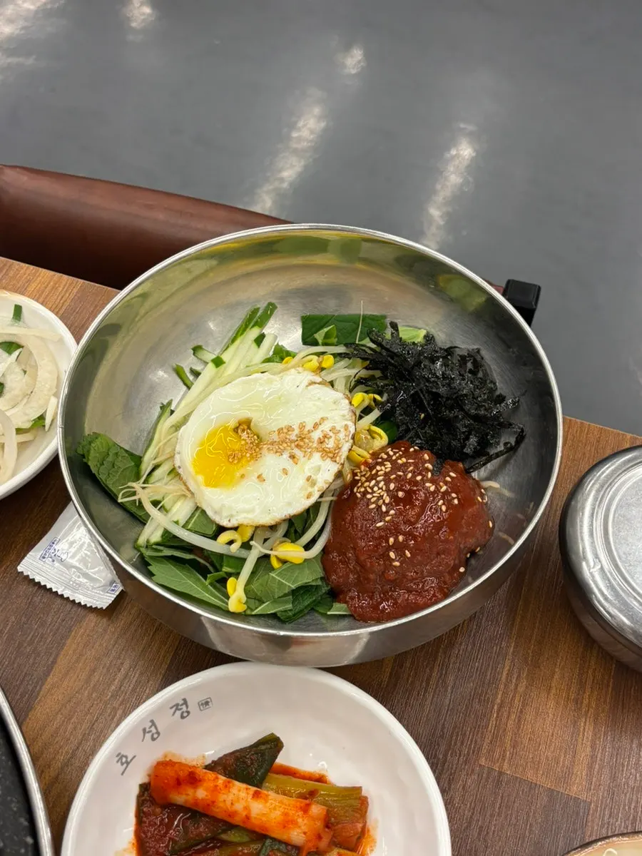 Table set with cheese steamed egg and yukhoe bibimbap