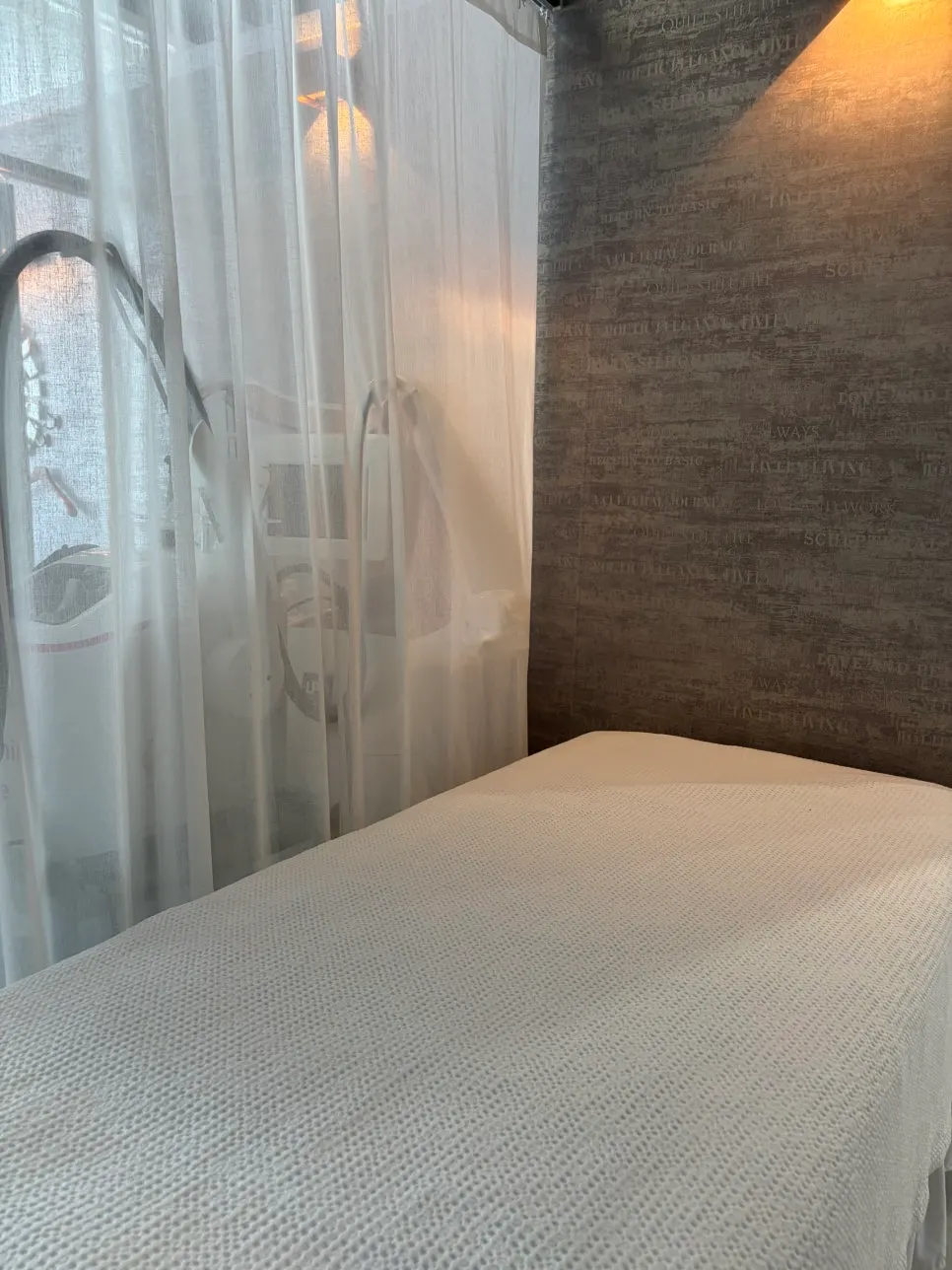 Lacaf treatment room with a care bed