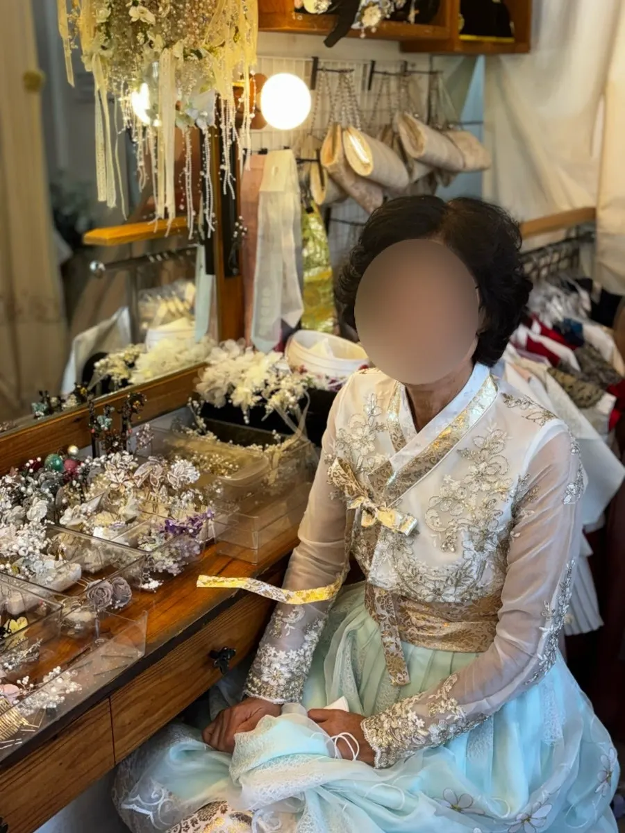 Grandmother in hanbok, full-length view