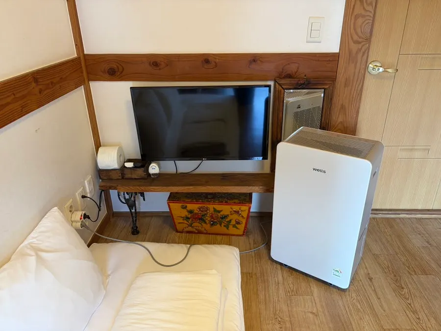 Room TV and traditional furniture pieces