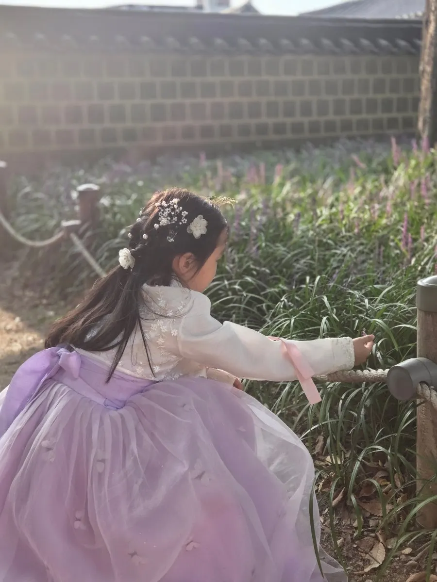 Walking through a Jeonju Hanok Village alley in hanbok