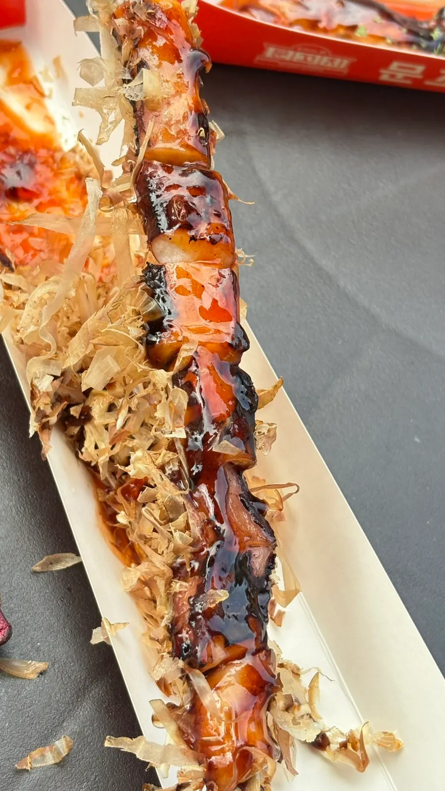 Close-up of the boneless teriyaki chicken skewer