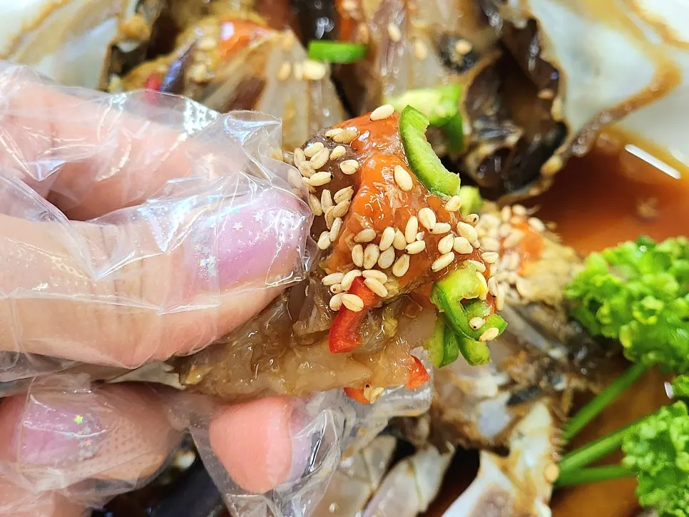 Cross-section of soy crab packed with meat and roe