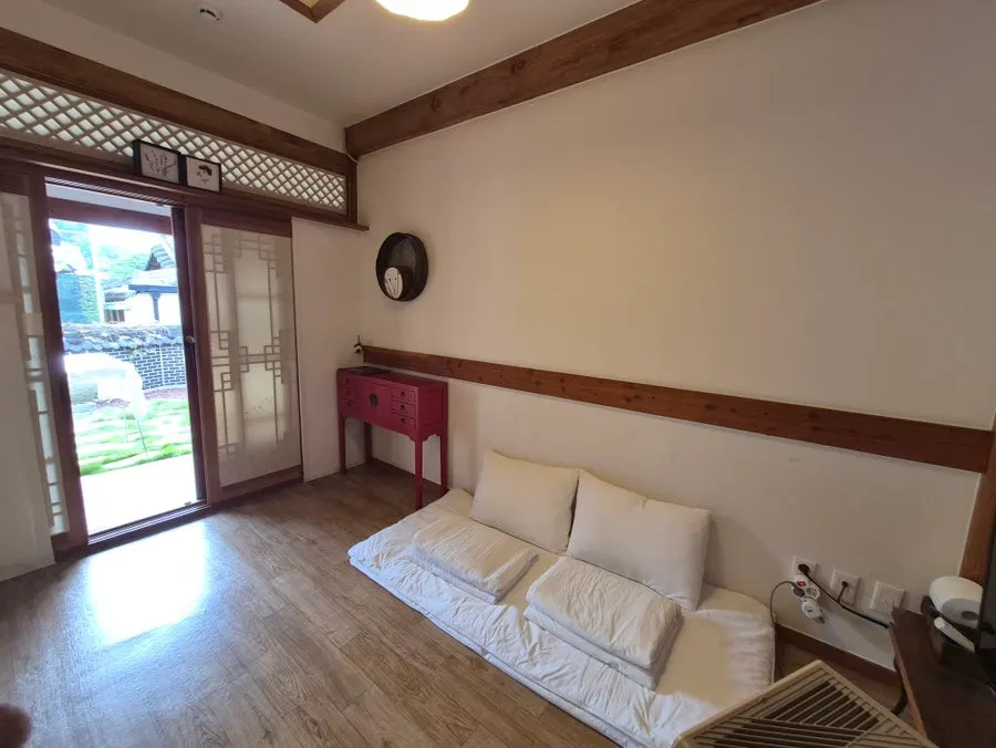 Walking path and hanok rooftops in Jeonju Hanok Village