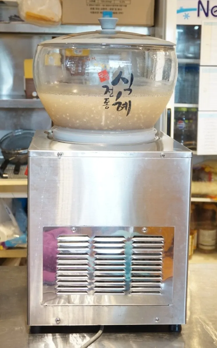 Menu board for slushies, sikhye, and Sangha Farm ice cream