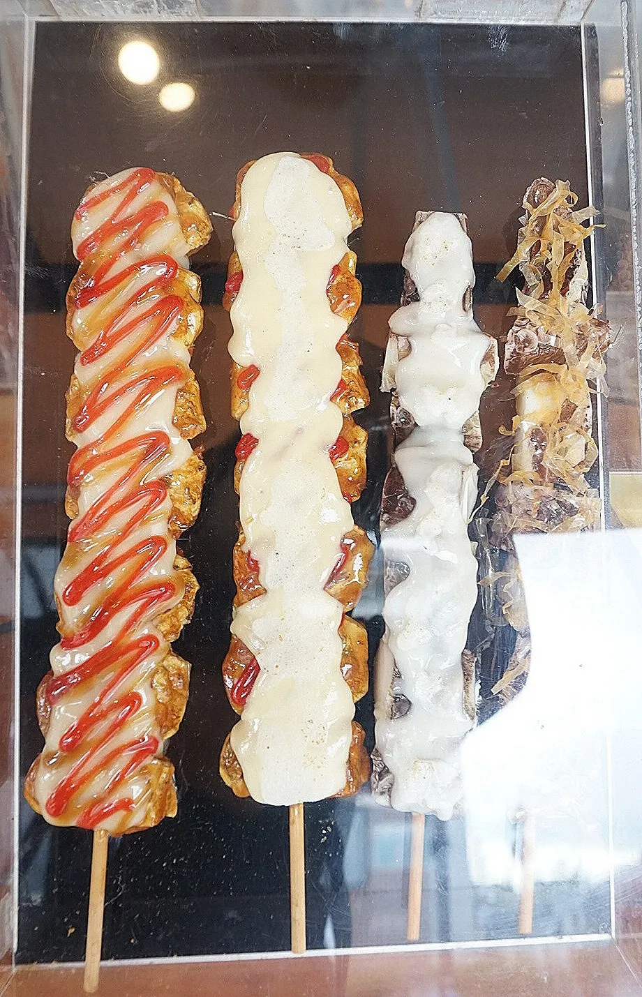 Realistic display model of the octopus skewer menu item