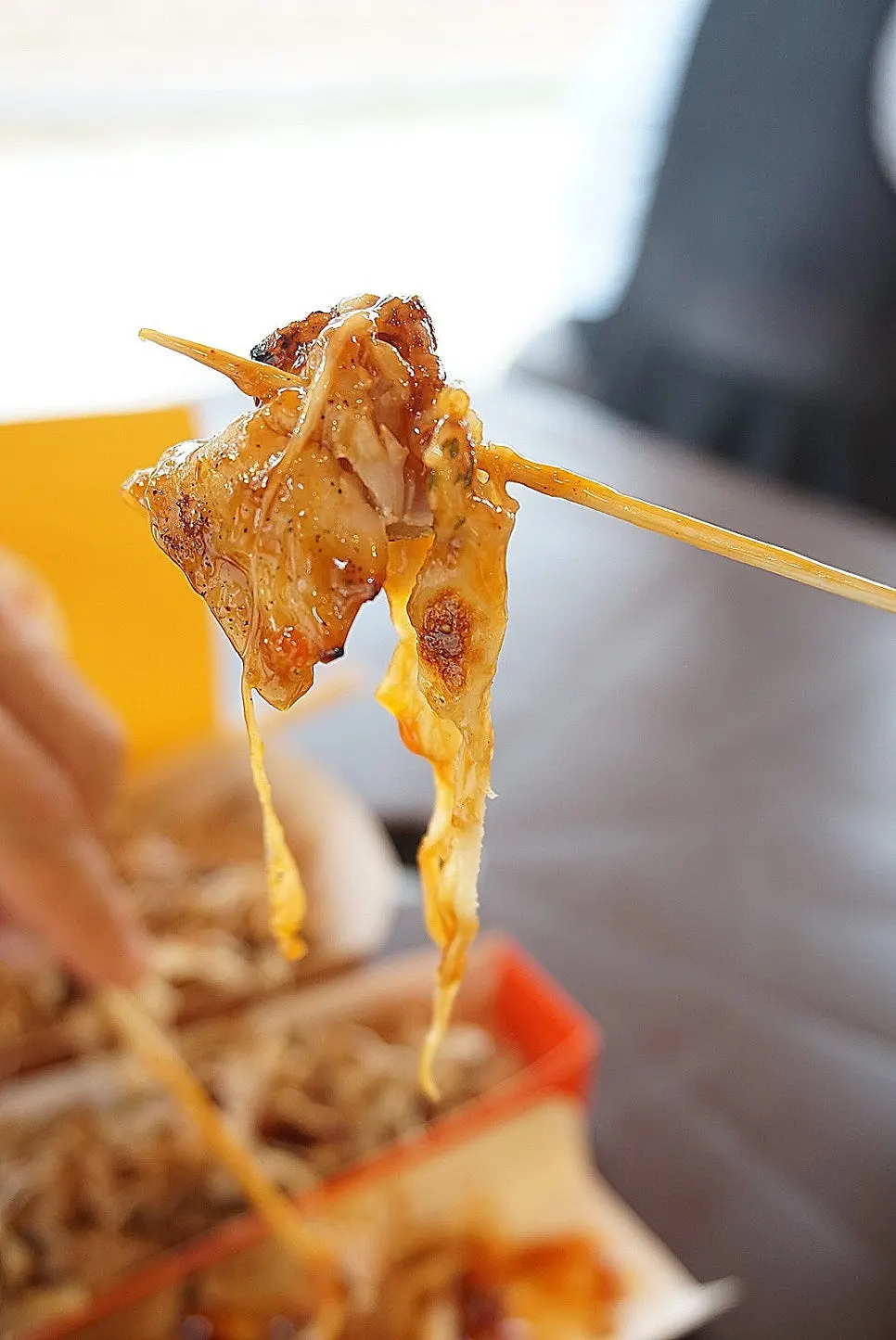 Close-up of the oven-warmed cheese chicken skewer