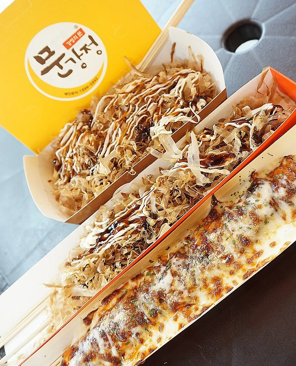 A full spread of octopus snacks from Munkkocchi Mungangjeong