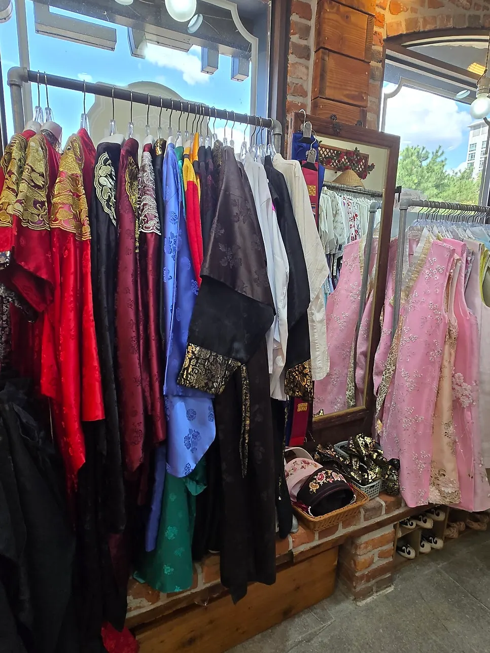 Display rack of hanbok with gold foil and embroidery